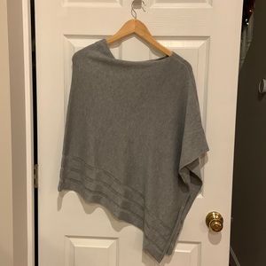 Gray knit poncho with asymmetrical hem. Korye brand, size XS/S